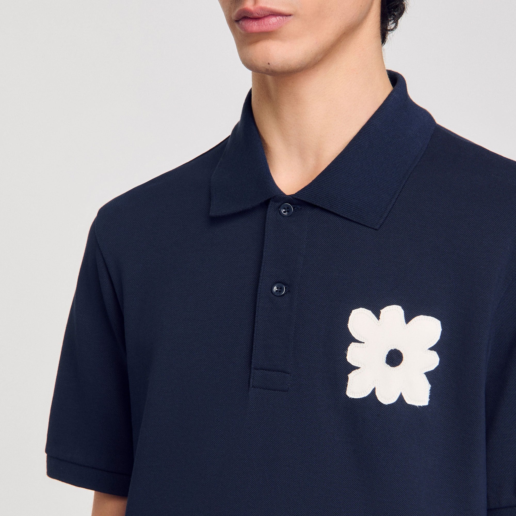 Sandro Men Polo shirt with flower patch