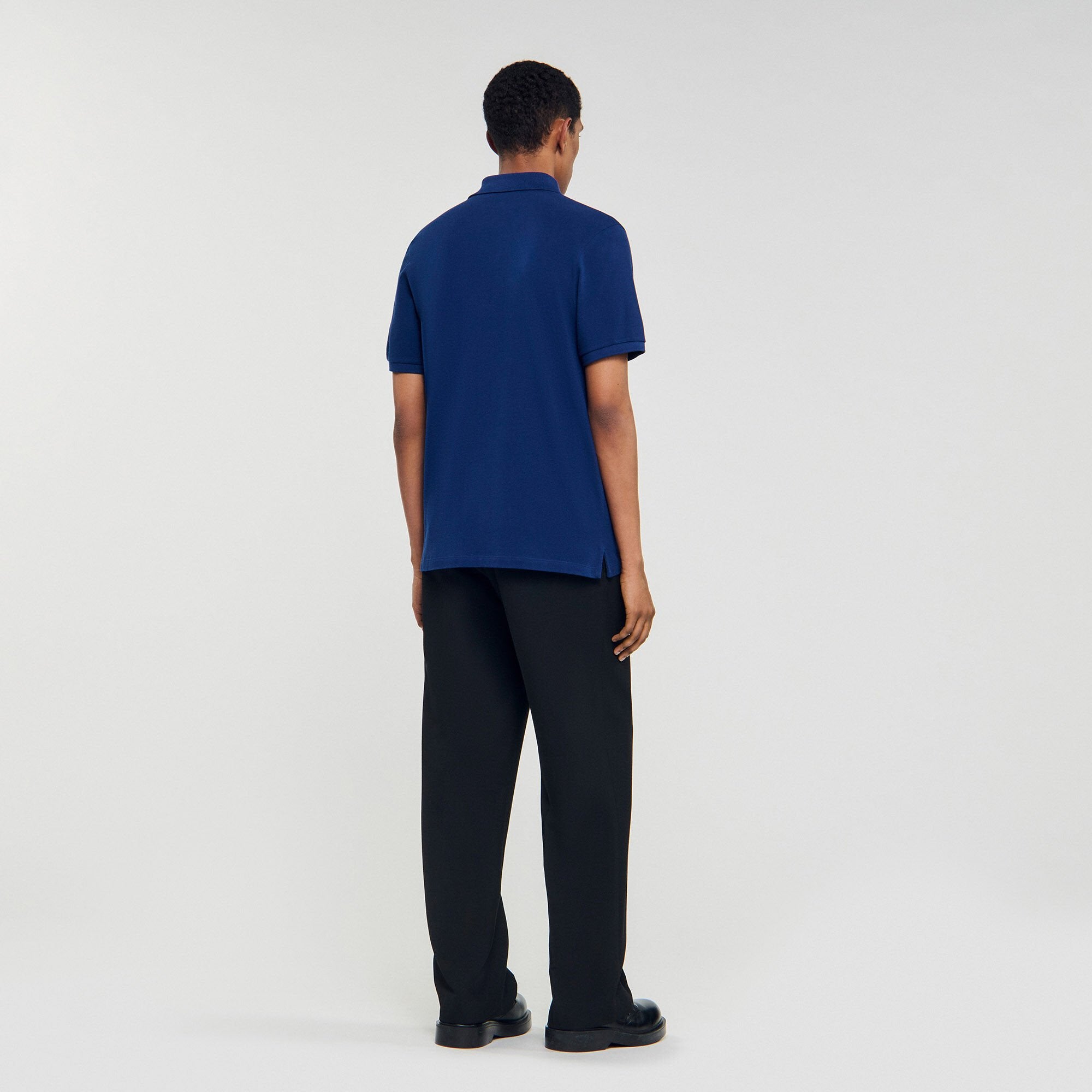 Sandro Men Polo shirt with leather logo